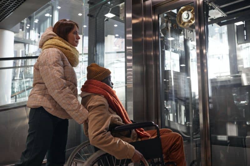 Interabled Couple Waiting for Elevator