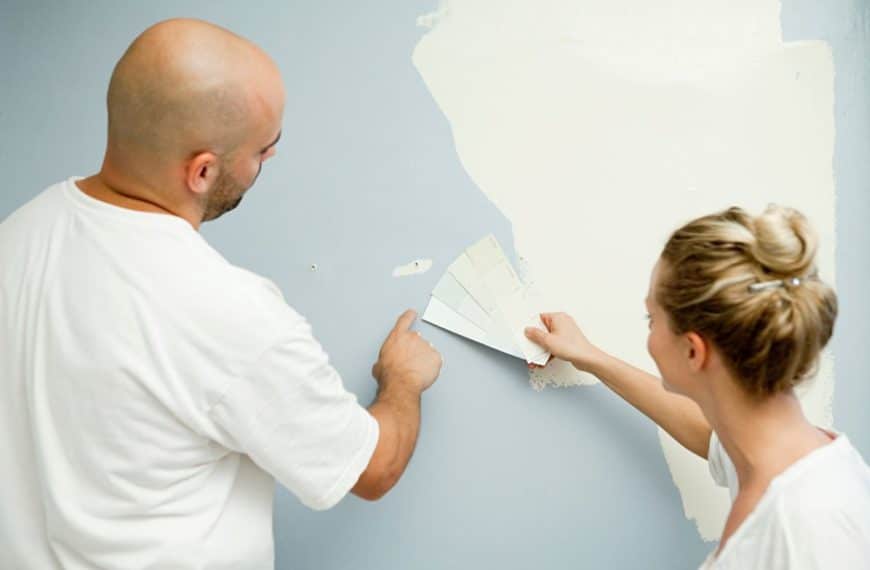 Couple choosing paint colors for a home renovation project